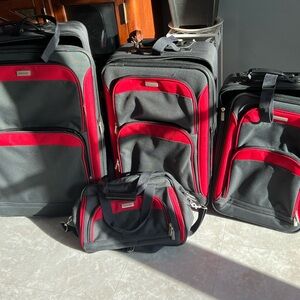 Red and Black Travel Bags Set with Soft-Sided Design and Multiple Sizes